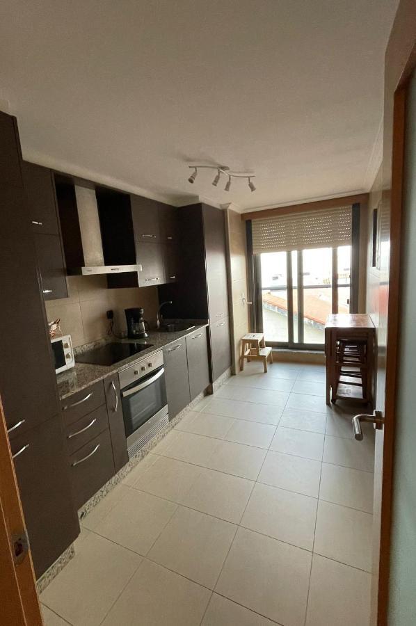 Apartamento En La Playa Apartment Ribeira Bagian luar foto